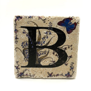 Alphabet letter B design printed on a natural stone coaster