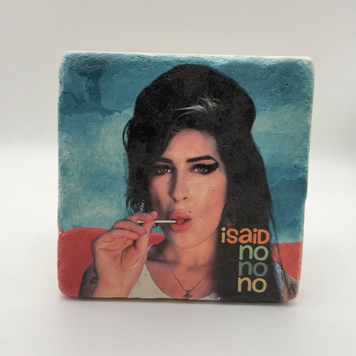 Amy Winehouse artwork printed on square travertine stone coaster