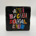 Anti-Social Social Club quote printed on square travertine stone coaster