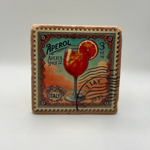 Aperol logo printed on square travertine stone coaster