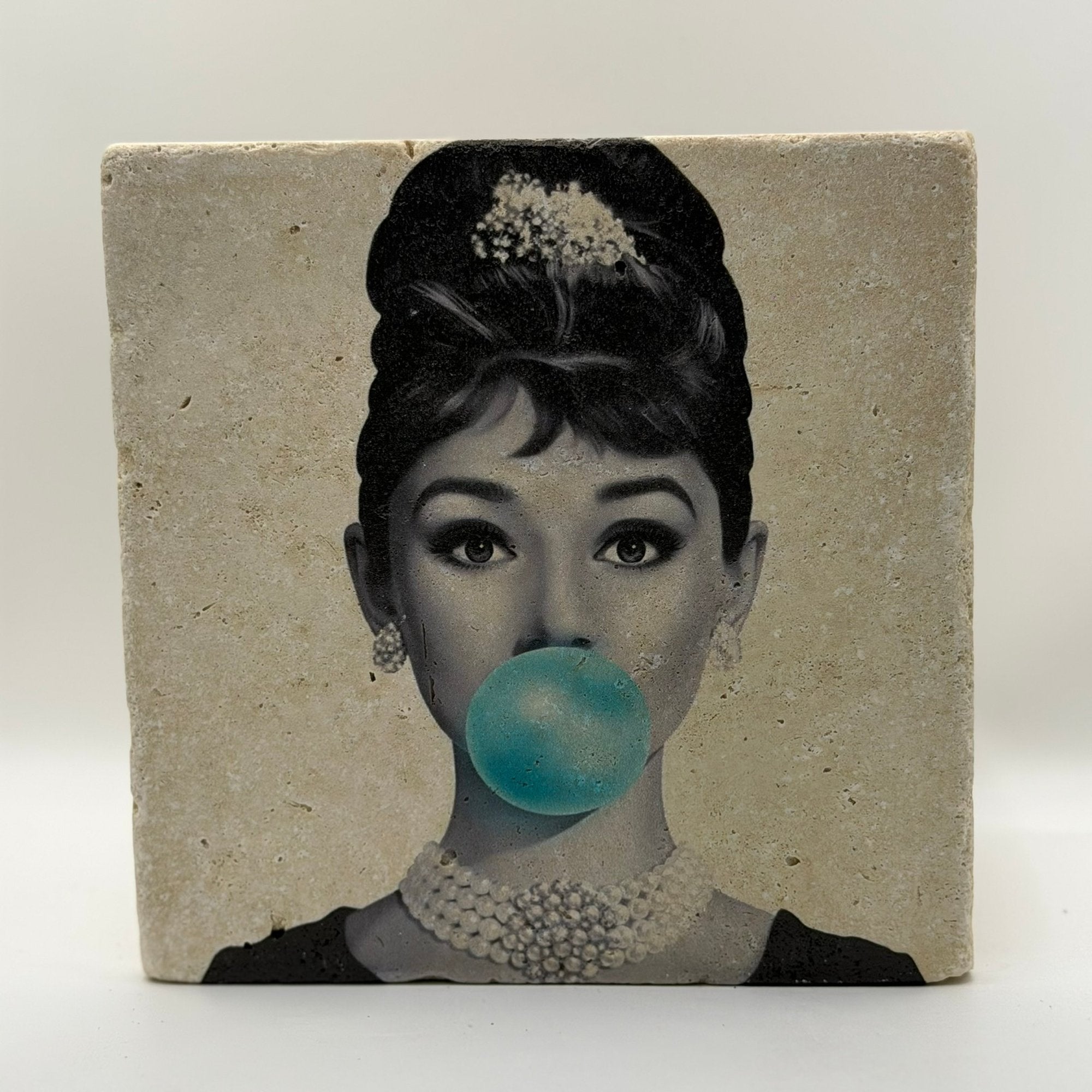 Audrey Hepburn Blue Bubble Natural Travertine Stone Hotpad artwork
