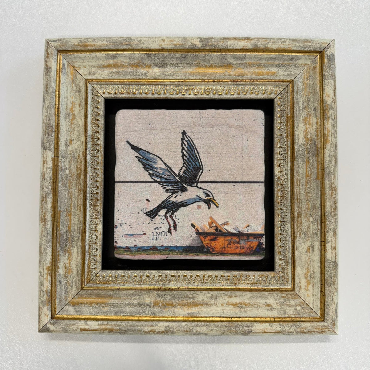 Variant Mapping v4 | banksy-banksy-swooping-seagull-natural-stone-coaster | with Gold Frame | sha256:57d3bdab783d