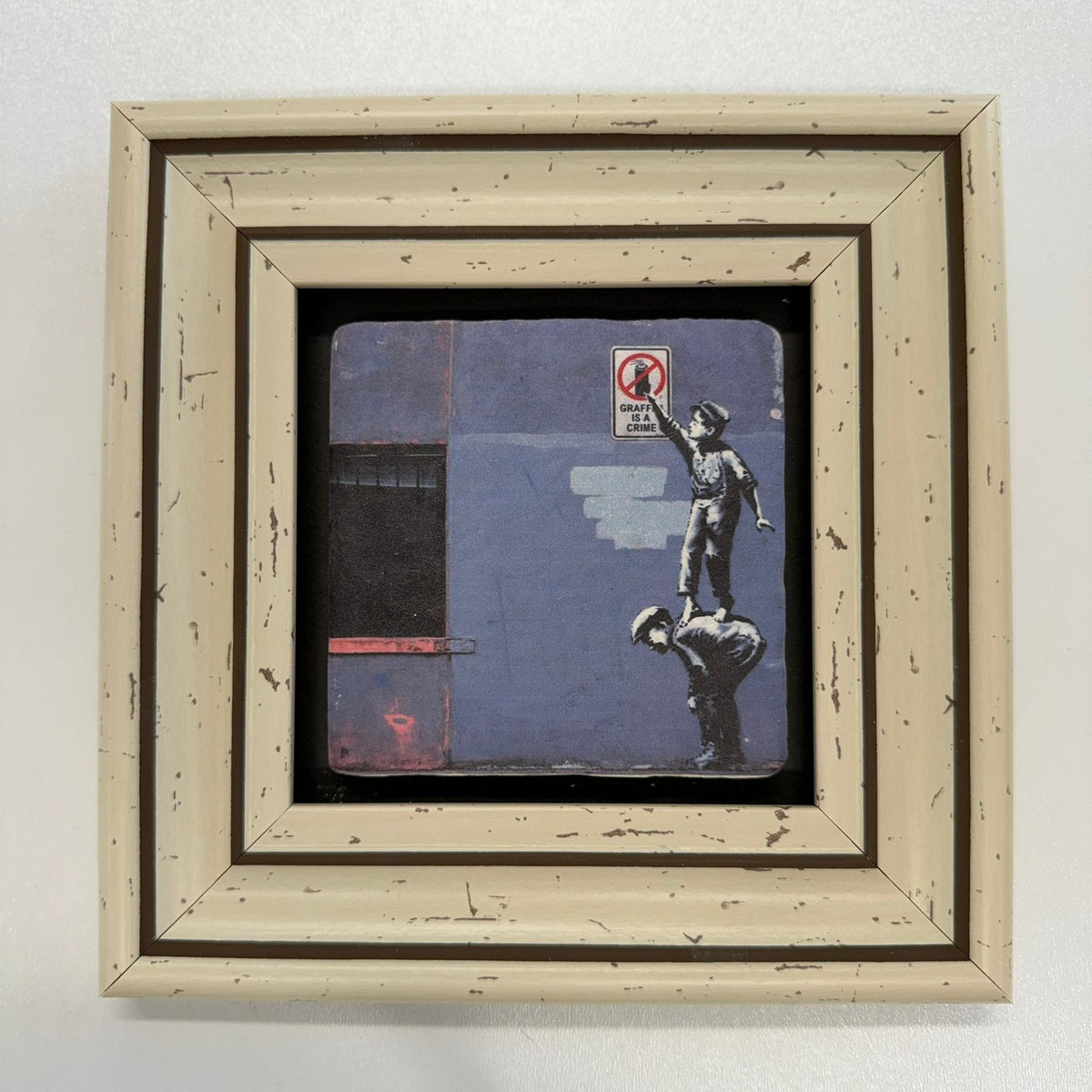 Variant Mapping v4 | banksy-graffiti-is-a-crime-natural-stone-coaster | with White Frame | sha256:245e03181425