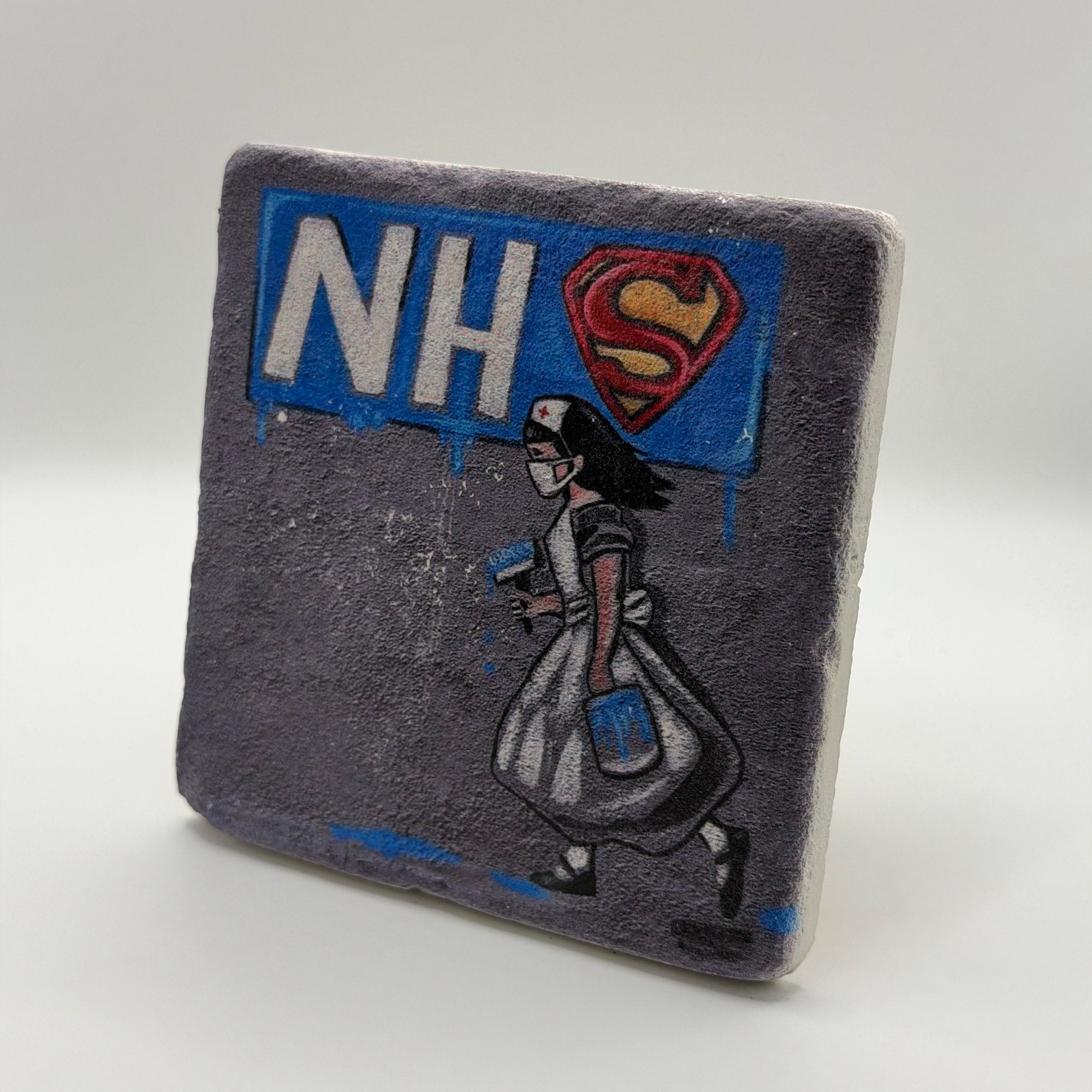 Banksy's NHS artwork printed on square travertine stone coaster
