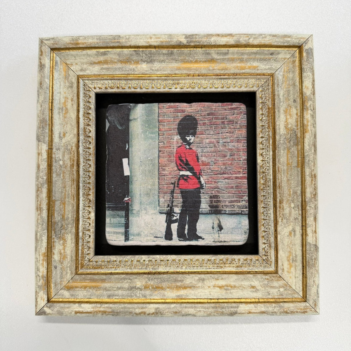 Variant Mapping v4 | banksy-pissing-guard-natural-stone-coaster | with Gold Frame | sha256:2cf9273b4d83
