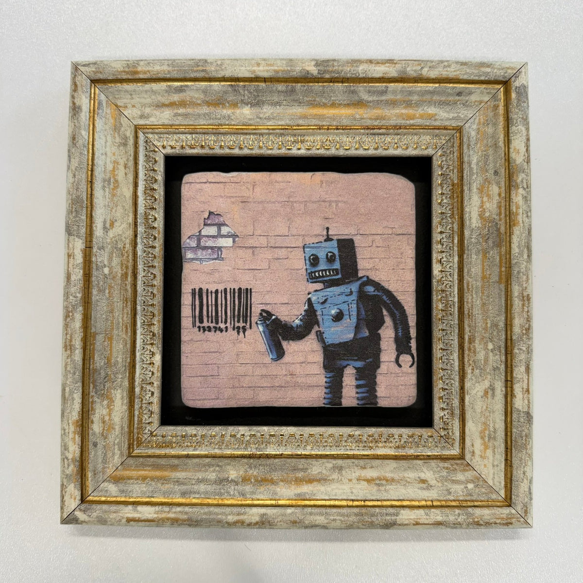 Variant Mapping v4 | banksy-robot-natural-stone-coaster | with Gold Frame | sha256:efd14bf1336a