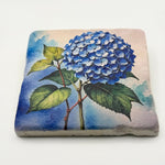 Vintage blue hydrangea artwork printed on square travertine stone coaster