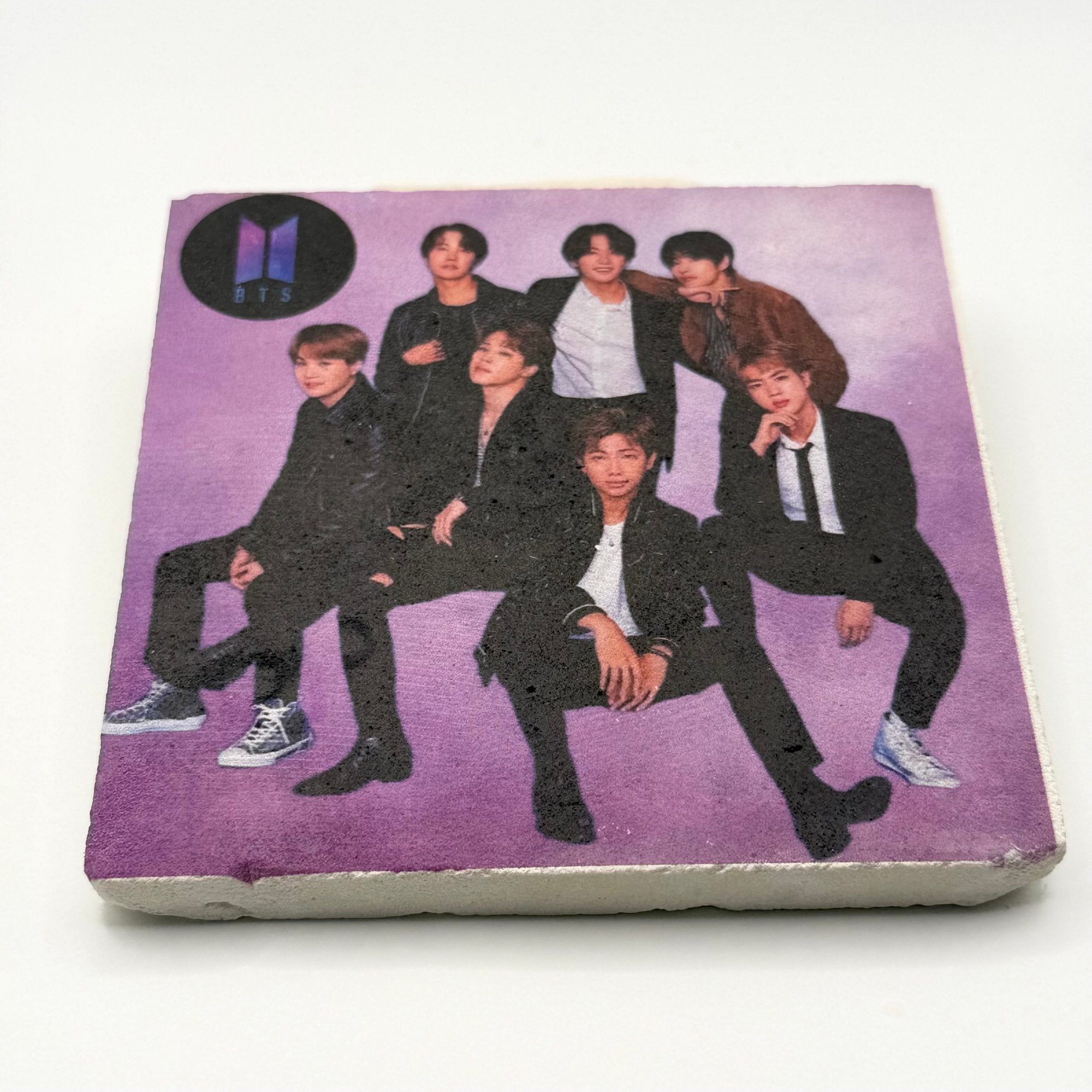 BTS artwork printed on square travertine stone coaster