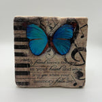 Blue butterfly artwork printed on square travertine stone coaster