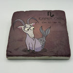 Capricorn astrological symbol printed on square travertine stone coaster