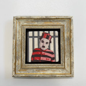 Variant Mapping v4 | charlie-chaplin-as-the-little-tramp-natural-stone-coaster | with Gold Frame | sha256:471868ab4d44