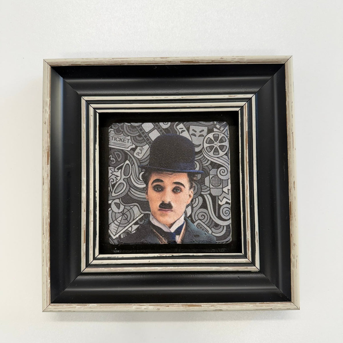 Variant Mapping v4 | charlie-chaplin-classic-natural-stone-coaster | with Black Frame | sha256:f536eeebdf67