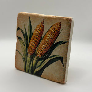 Retro illustration of a corn cob printed on square travertine stone coaster