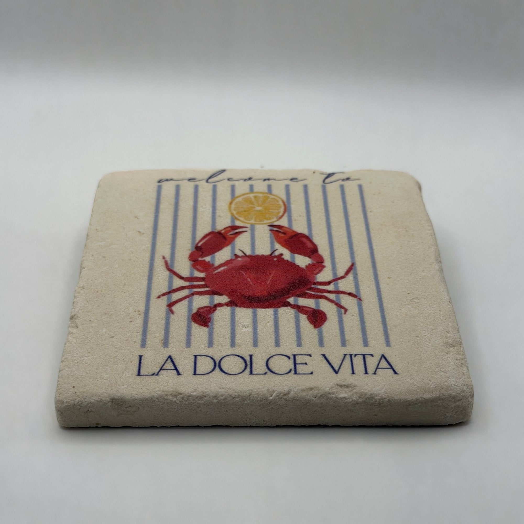 Colorful crab artwork printed on square travertine stone coaster