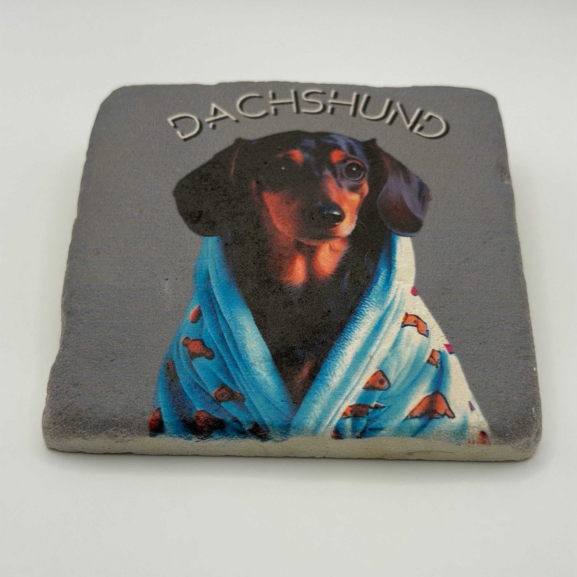 Dachshund artwork printed on premium natural travertine stone coaster