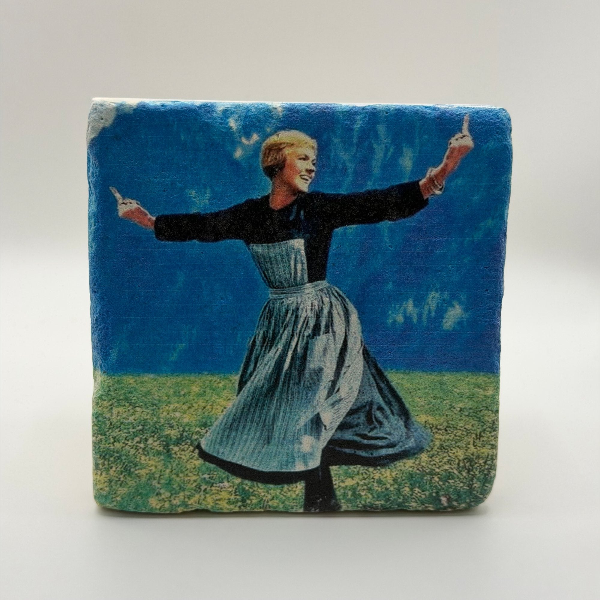 Dancing nun artwork printed on square natural travertine stone coaster