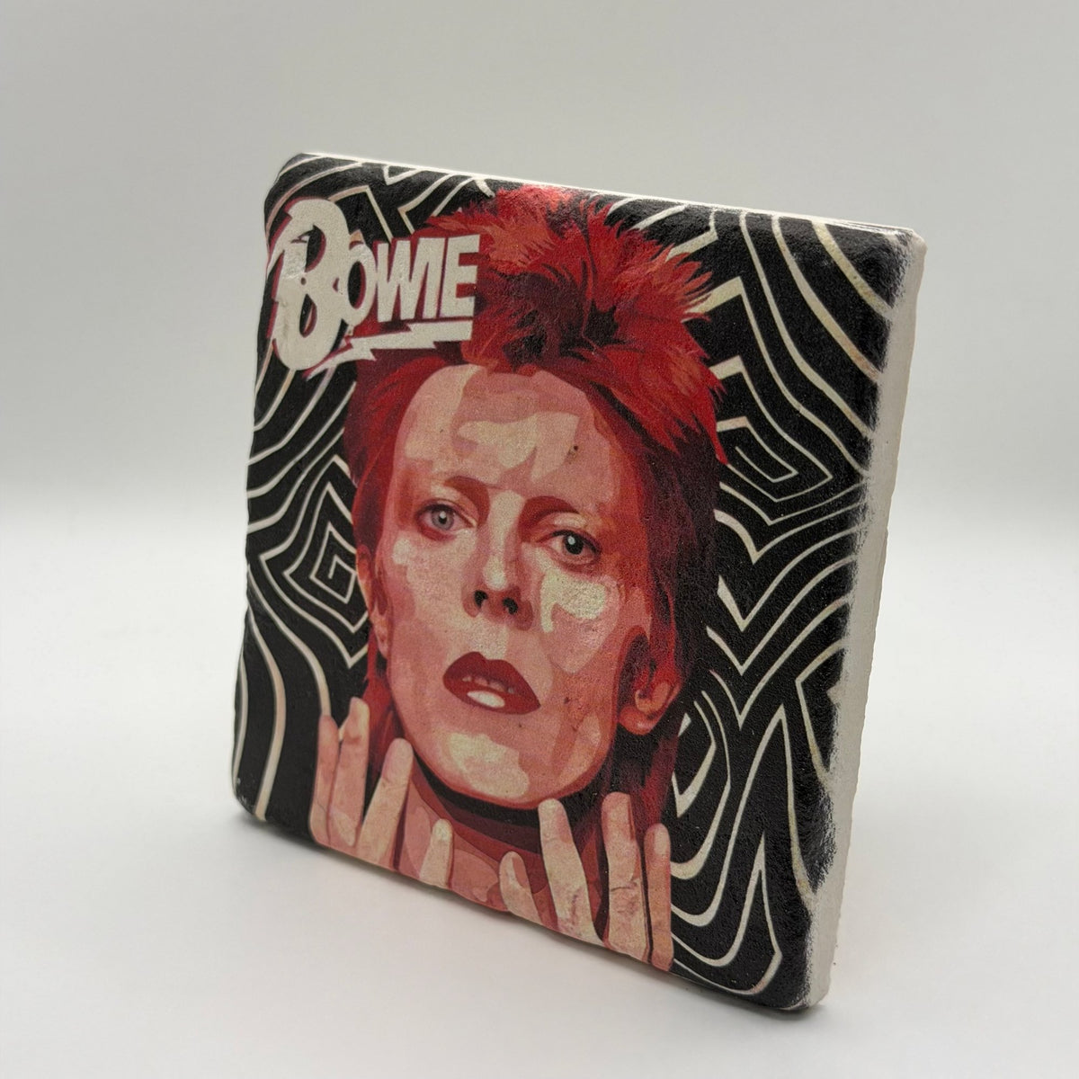David Bowie artwork printed on square travertine stone coaster