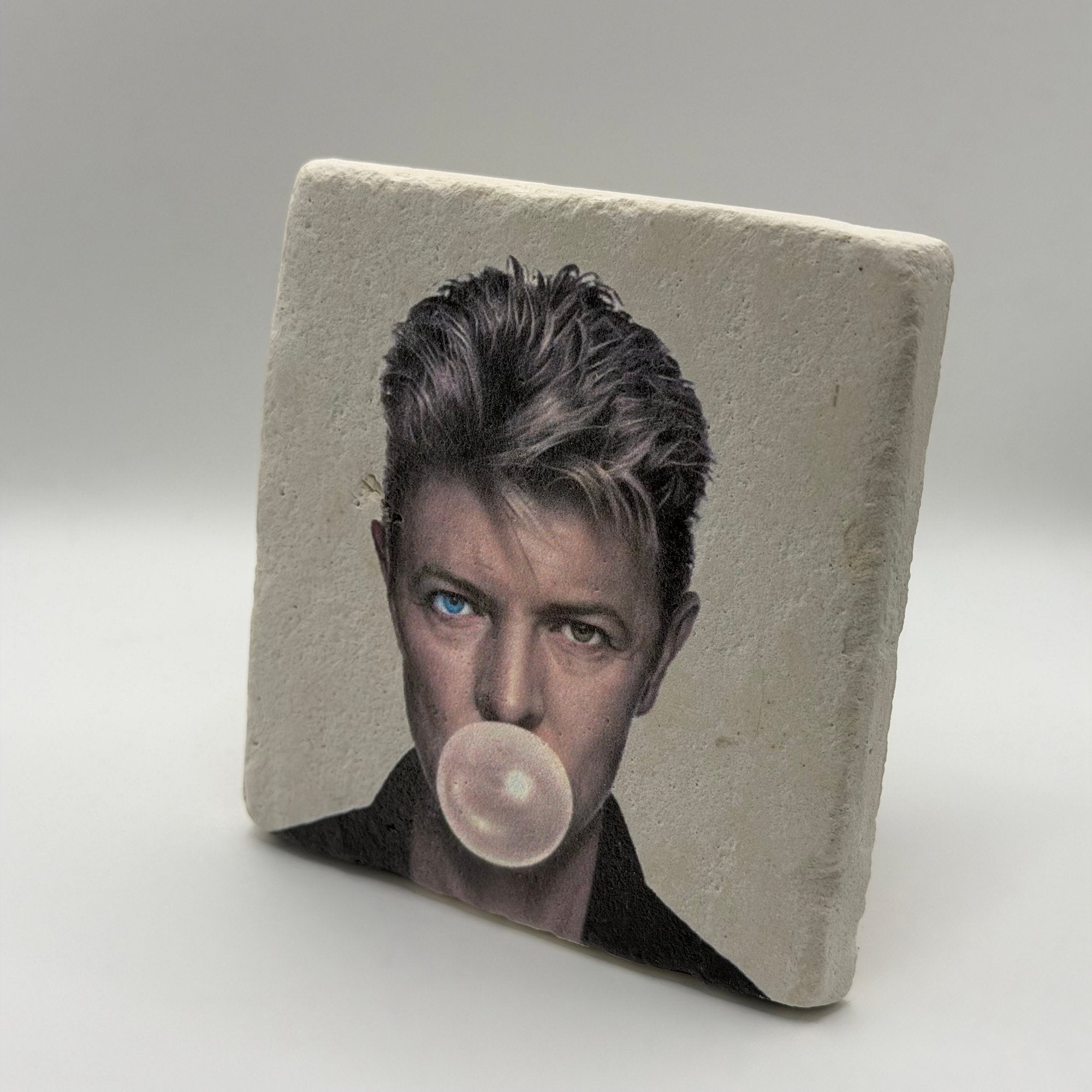 David Bowie artwork printed on square travertine stone coaster