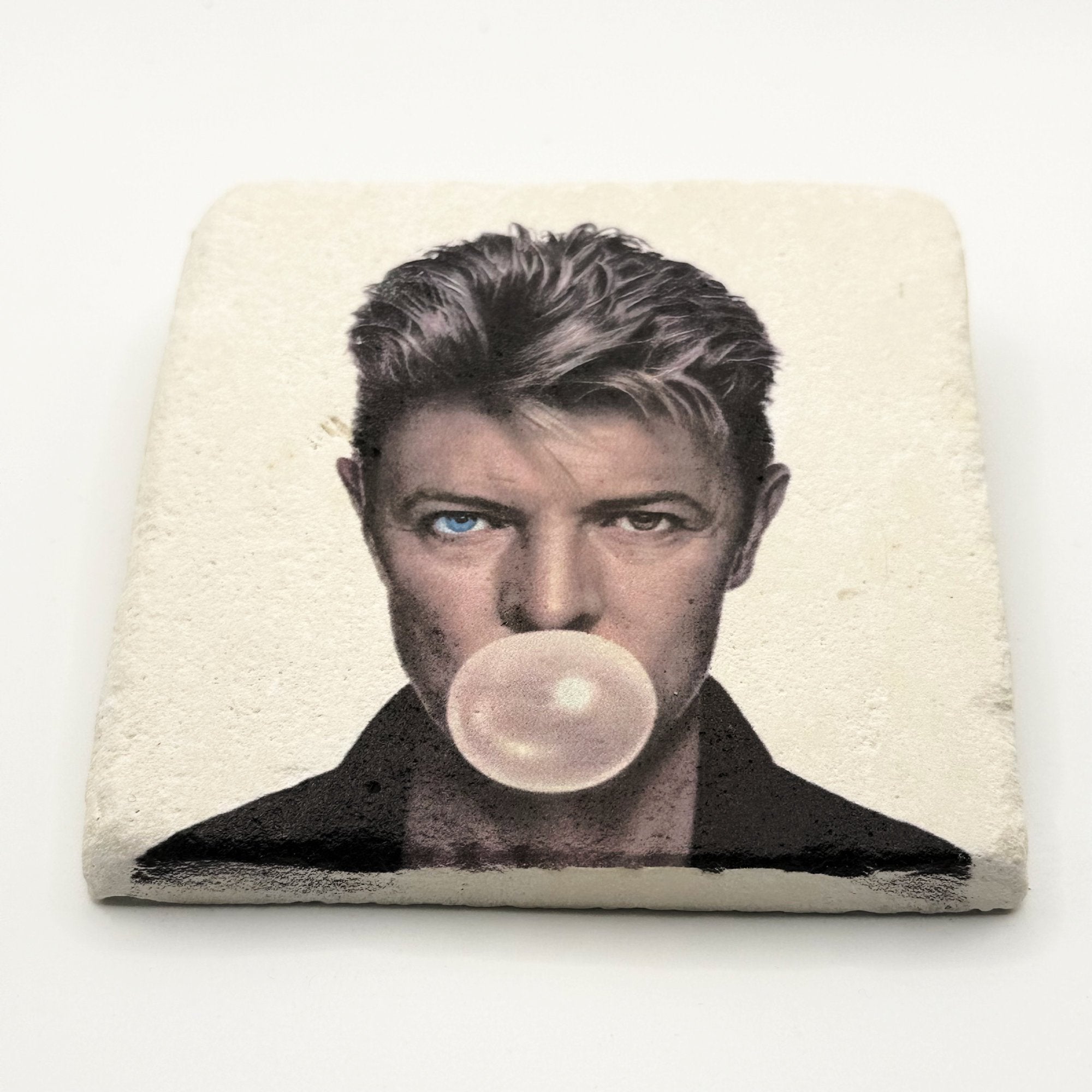 David Bowie artwork printed on square travertine stone coaster