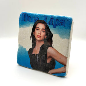 Dua Lipa artwork printed on square travertine stone coaster