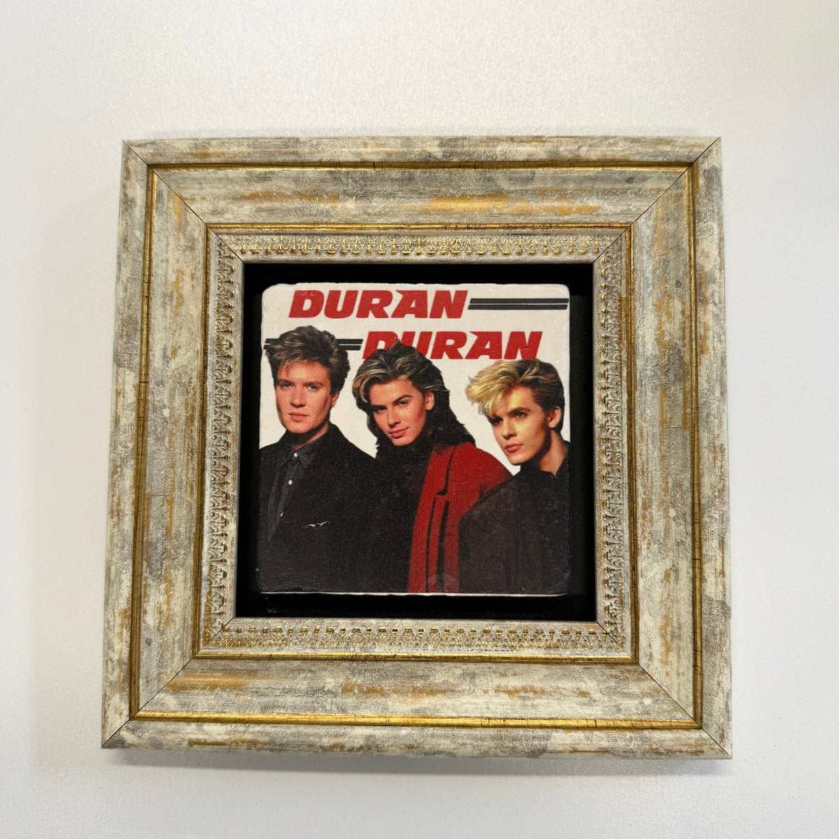 Variant Mapping v4 | duran-duran-natural-stone-coaster | with Gold Frame | sha256:9e78b40ac9e8