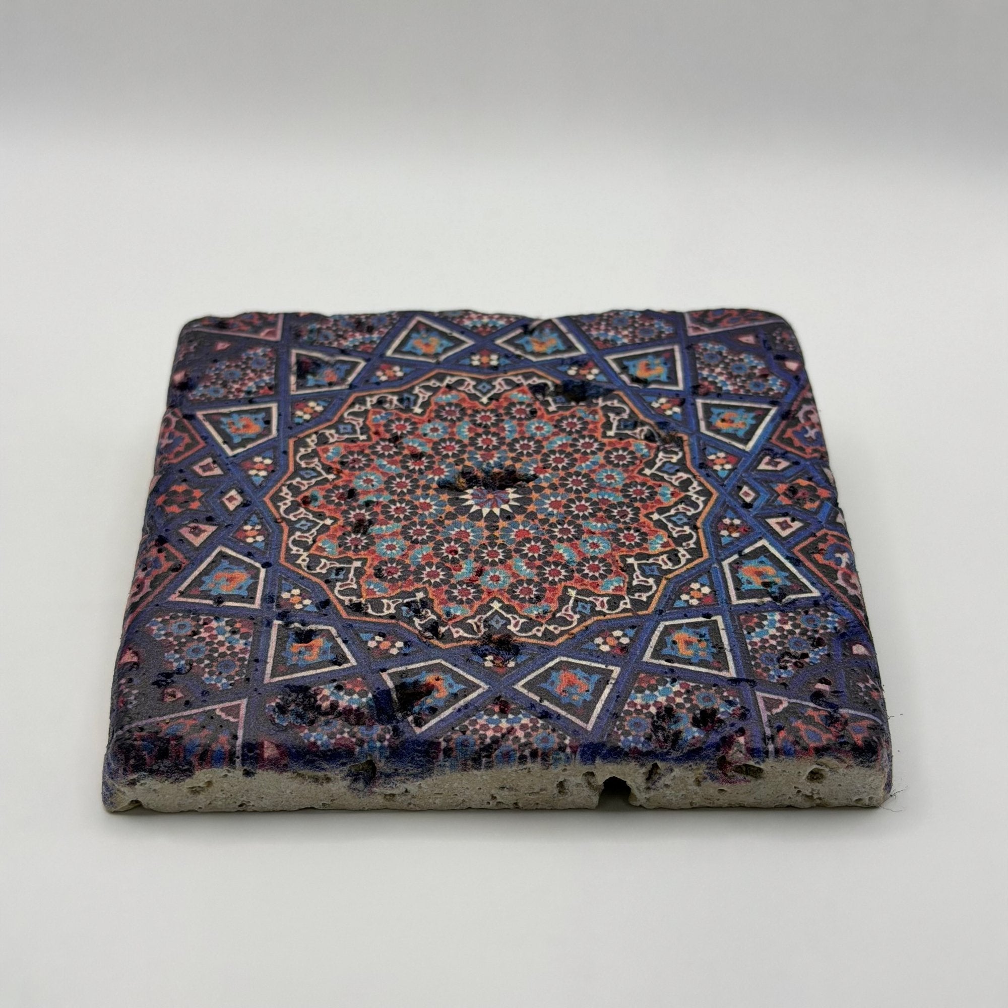 Ethnics pattern number 02 printed on a natural travertine stone coaster