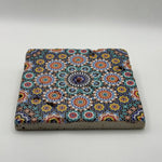 Ethnics pattern number 03 printed on a natural travertine stone coaster