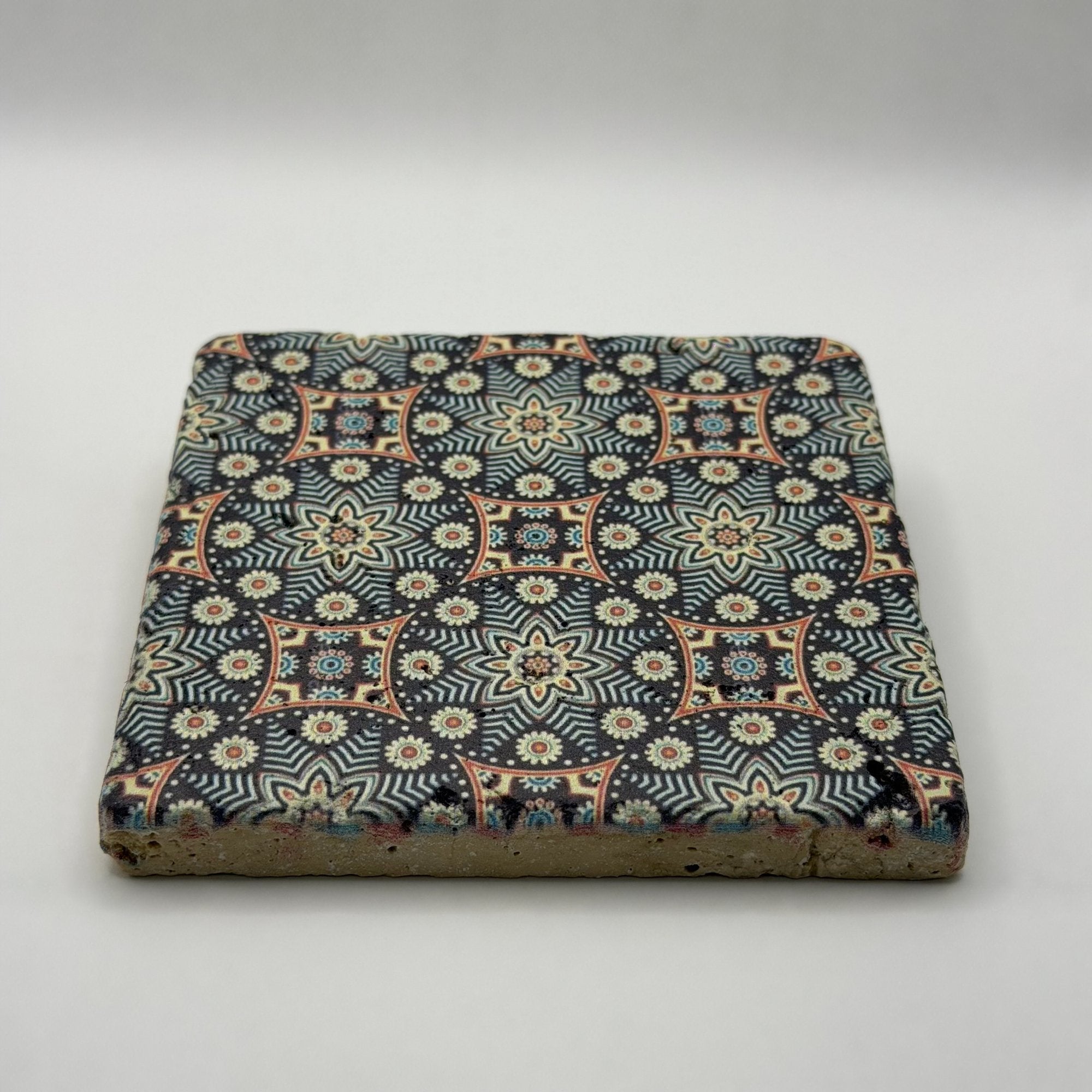 Ethnics pattern number 04 printed on a natural travertine stone coaster