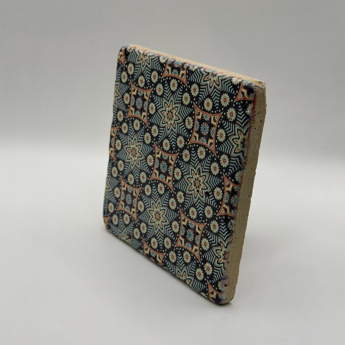 Ethnics pattern number 04 printed on a natural travertine stone coaster