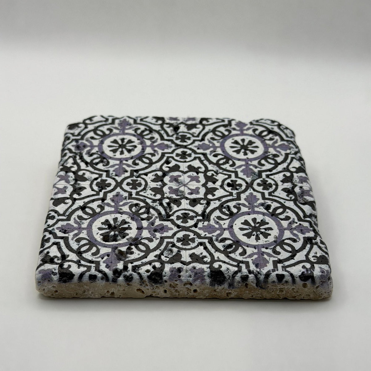 Ethnics pattern number 05 printed on a natural travertine stone coaster