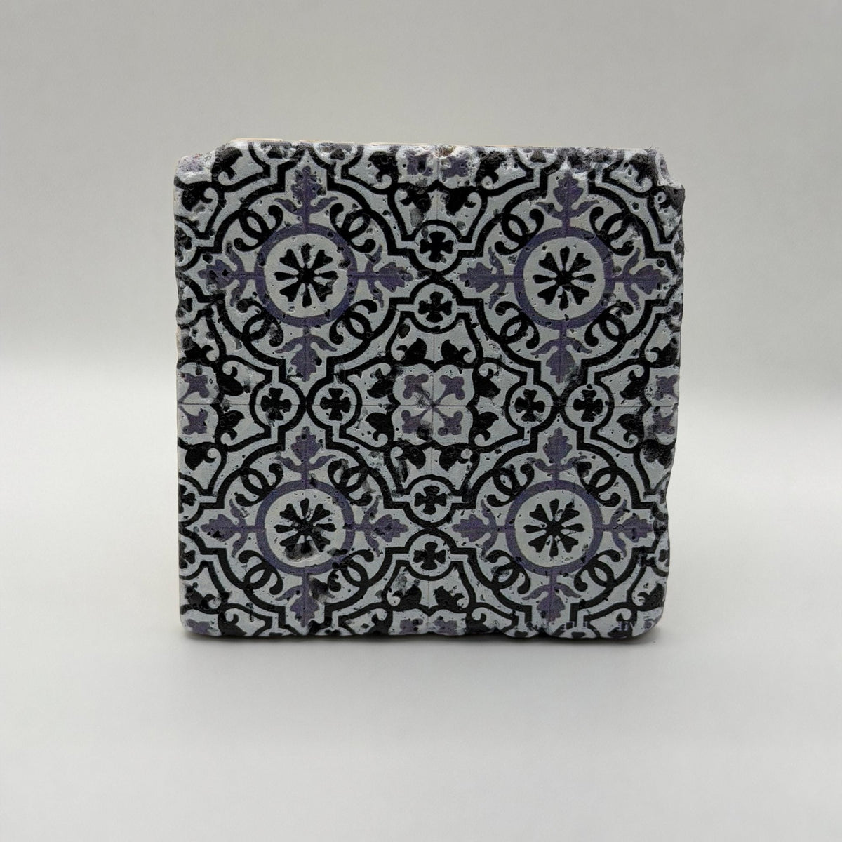 Ethnics pattern number 05 printed on a natural travertine stone coaster