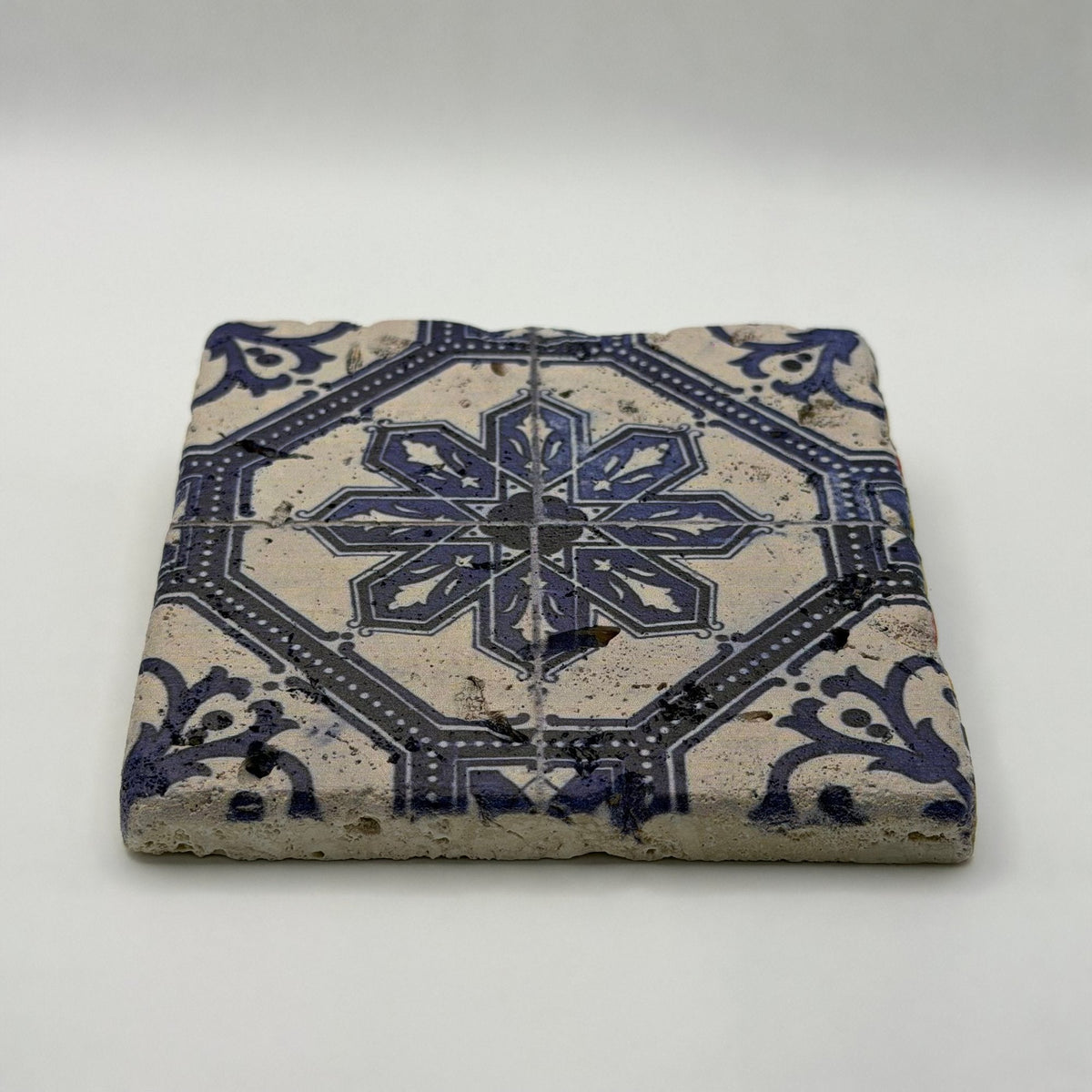 Ethnics pattern number 06 printed on a natural travertine stone coaster