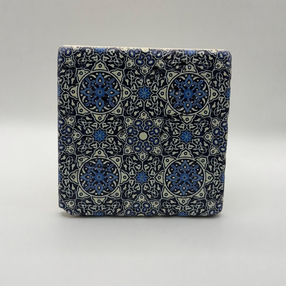 Ethnics pattern number 07 printed on a natural travertine stone coaster