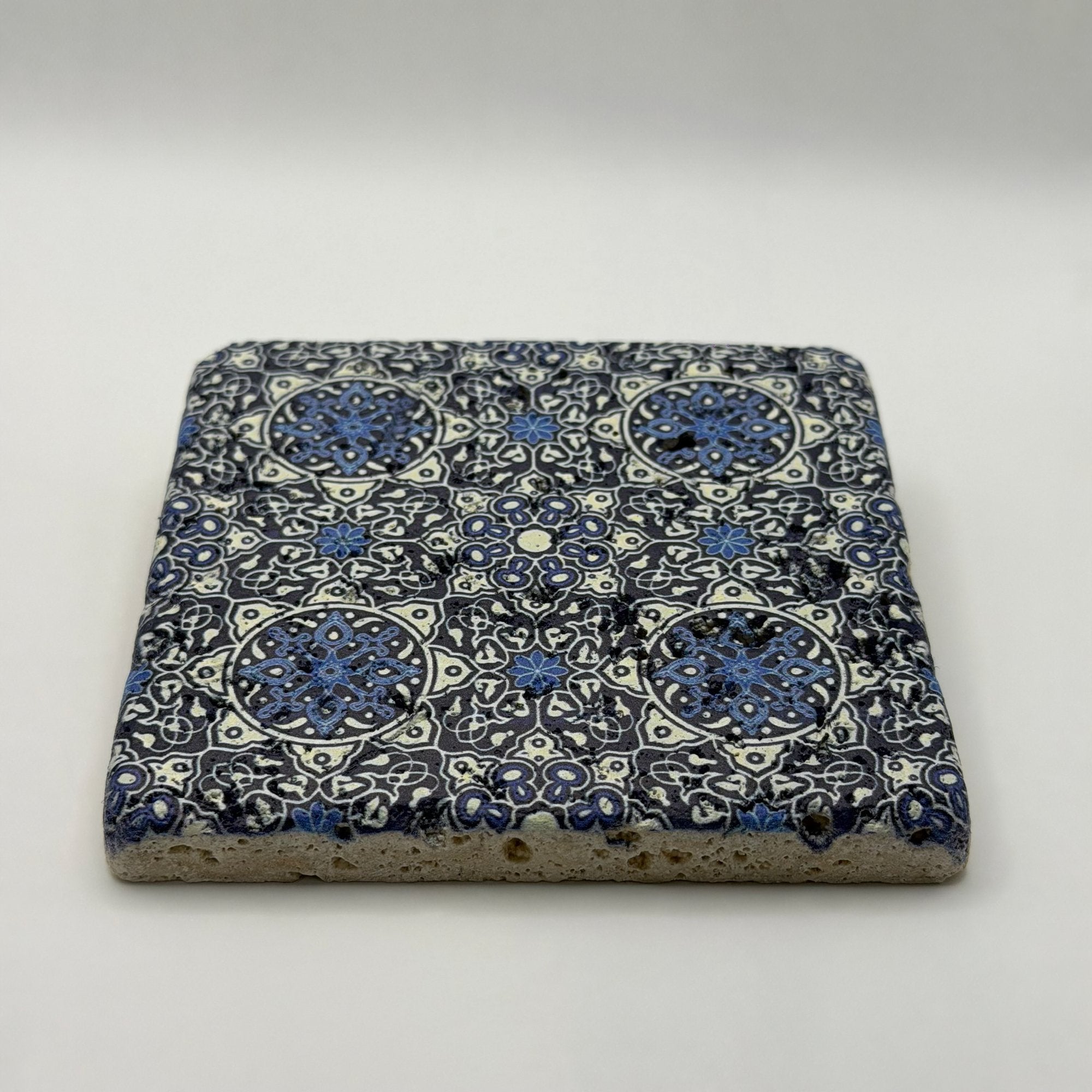 Ethnics pattern number 07 printed on a natural travertine stone coaster