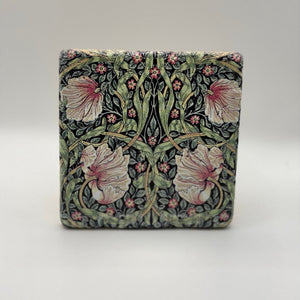 Ethnics pattern number 09 printed on a natural travertine stone coaster