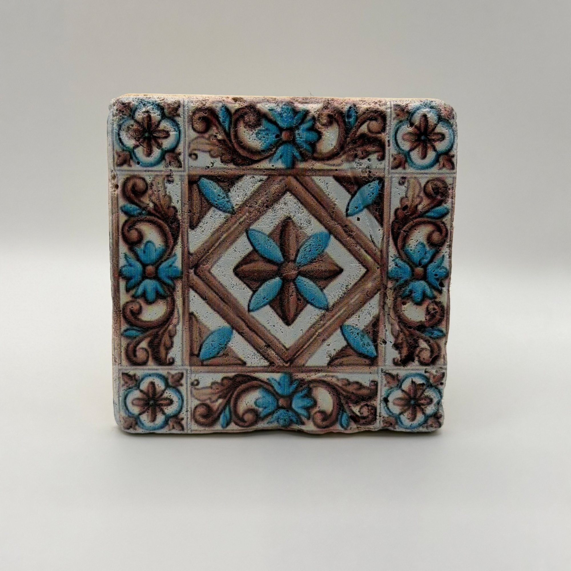 Ethnics pattern number 11 printed on a natural travertine stone coaster