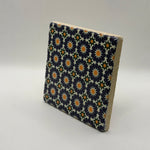 Ethnics pattern number 12 printed on a natural travertine stone coaster