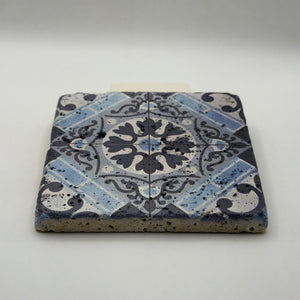 Ethnics pattern number 13 printed on a natural travertine stone coaster