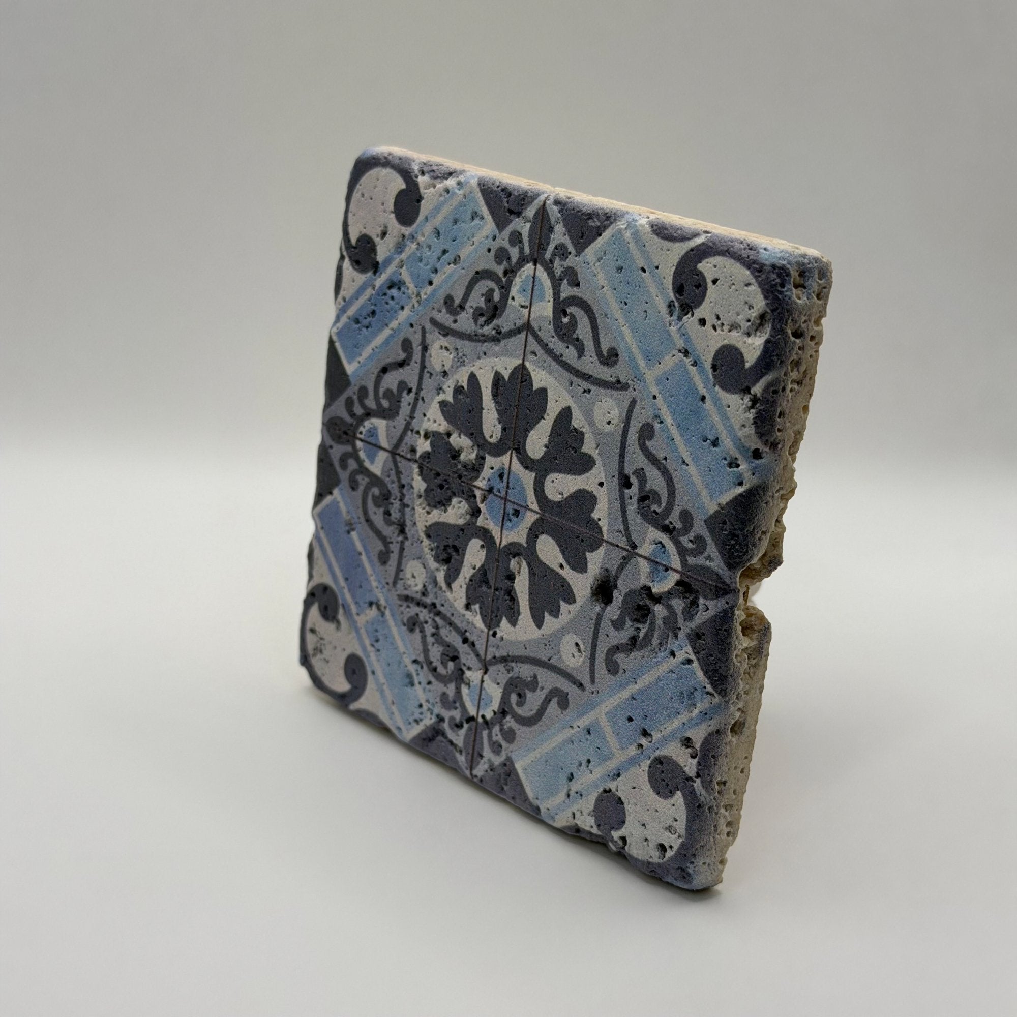 Ethnics pattern number 13 printed on a natural travertine stone coaster