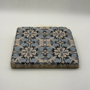 Ethnics pattern number 14 printed on a natural travertine stone coaster