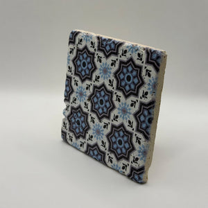 Ethnics pattern number 15 printed on a natural travertine stone coaster