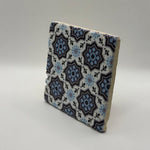 Ethnics pattern number 15 printed on a natural travertine stone coaster