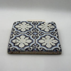 Ethnics pattern number 16 printed on a natural travertine stone coaster