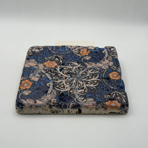Ethnics pattern number 17 printed on a natural travertine stone coaster