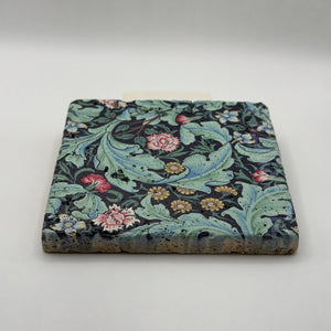 Ethnics pattern number 18 printed on a natural travertine stone coaster