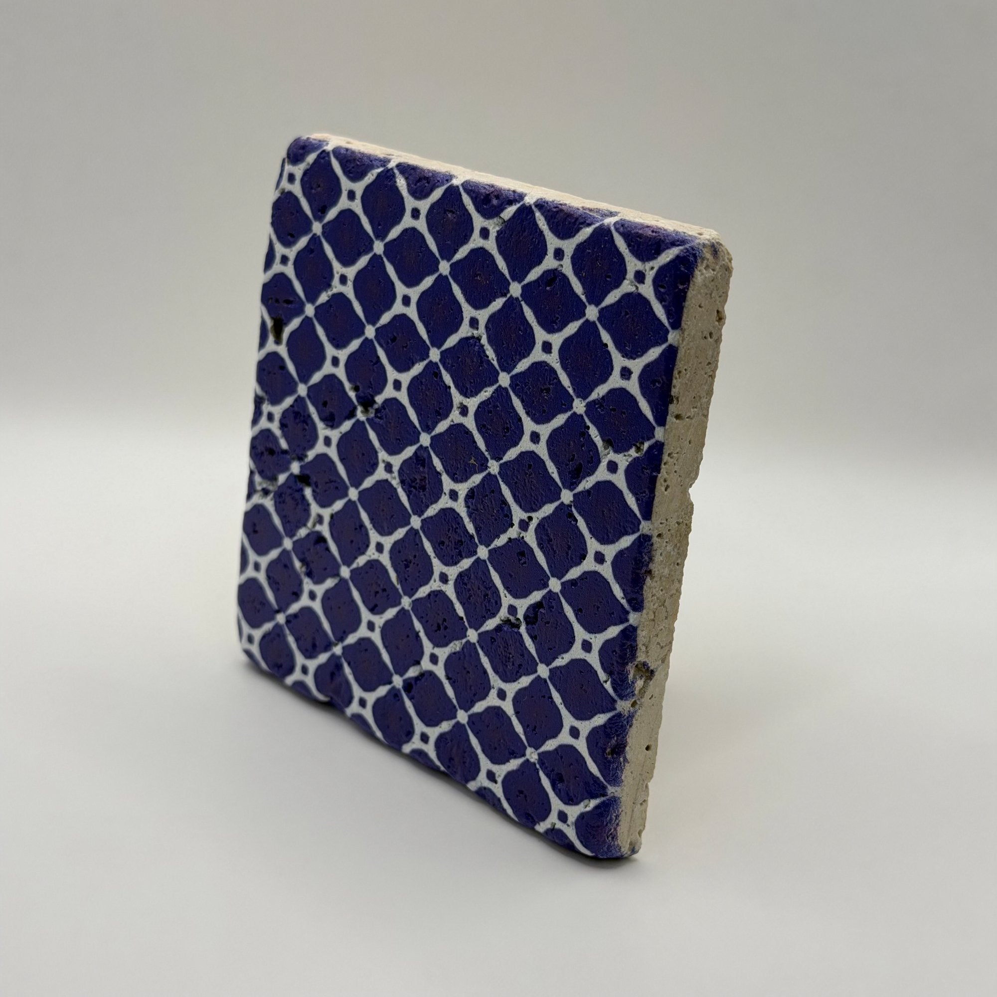Ethnics pattern number 26 printed on a natural travertine stone coaster