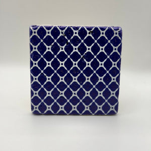 Ethnics pattern number 26 printed on a natural travertine stone coaster