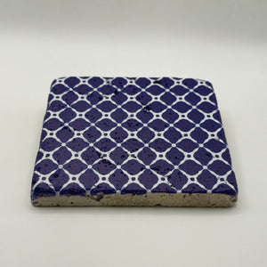 Ethnics pattern number 26 printed on a natural travertine stone coaster
