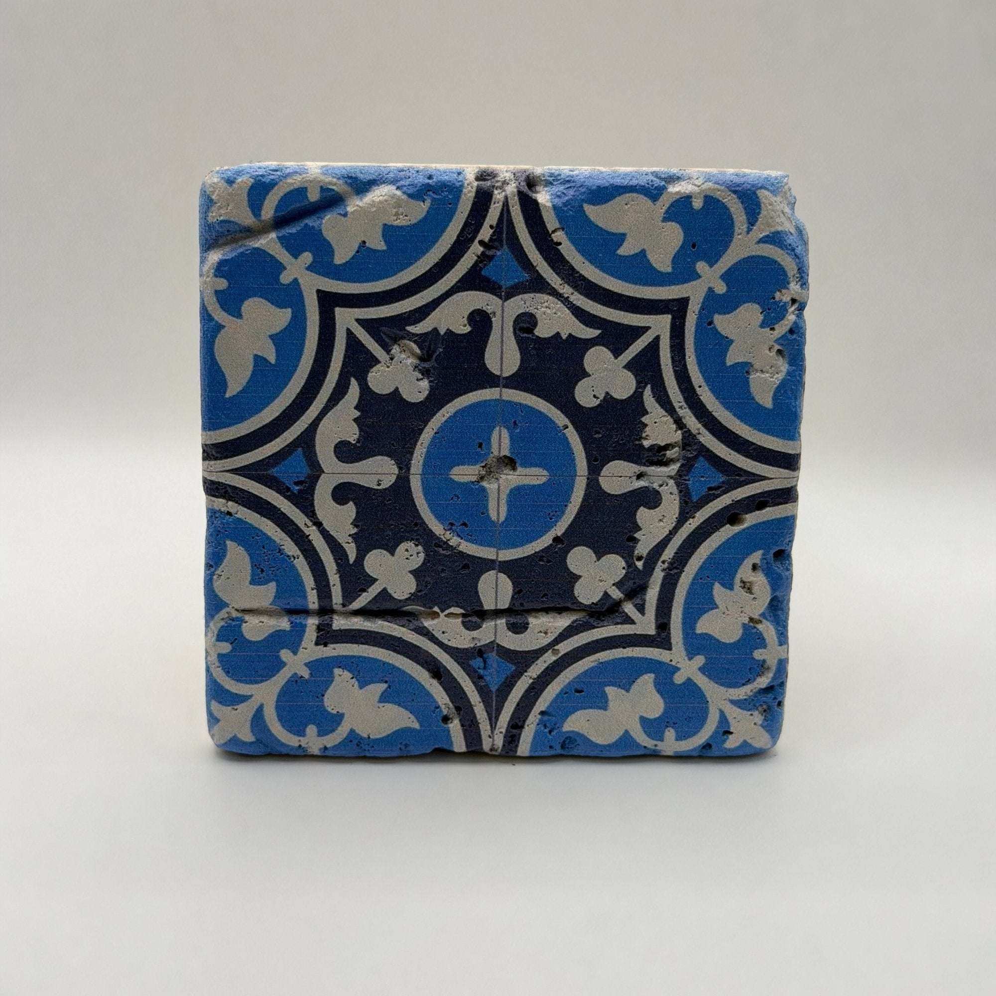 Ethnics pattern number 27 printed on a natural travertine stone coaster