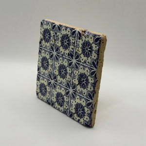 Ethnics pattern number 28 printed on a natural travertine stone coaster